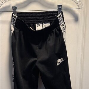 Nike Kids Black Joggers with White Trim